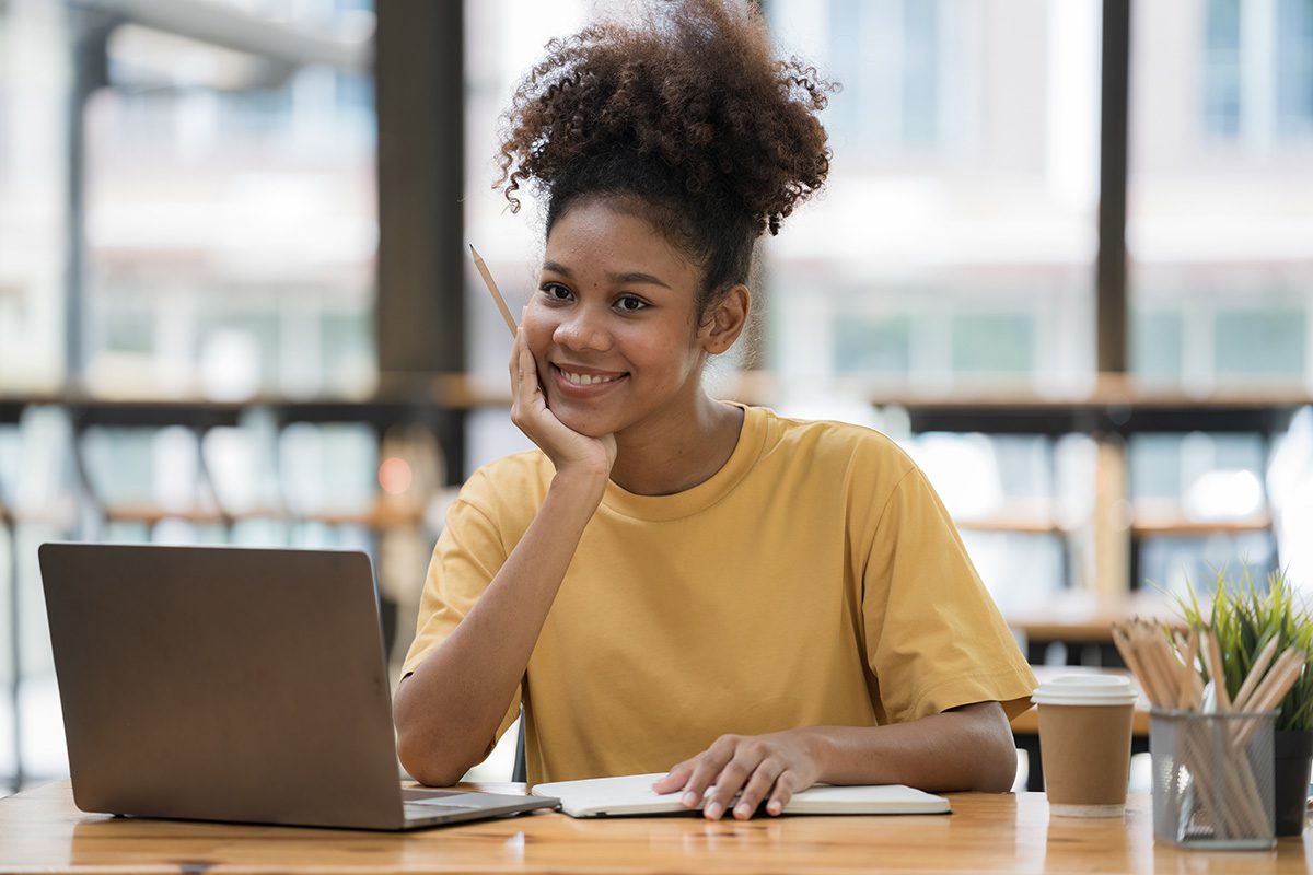 Young Female Professional at Laptop